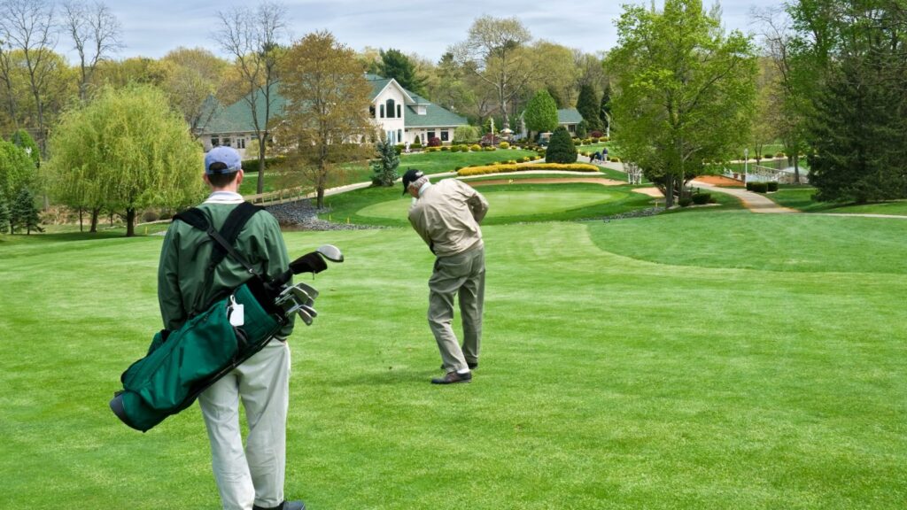 members playing golf at the country club