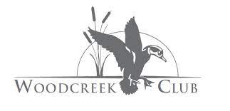 the woodcreek club logo